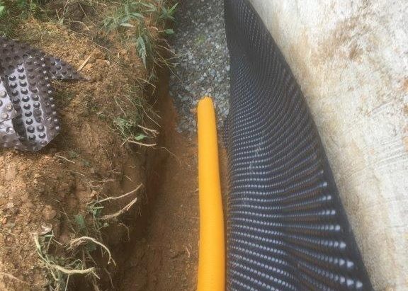 trench with pipework and gravel