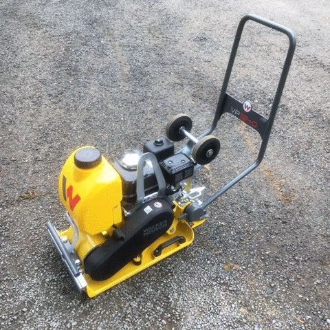 wackerplate machine on a gravel road